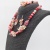 Комплект из розового агата бусы браслет и серьги арт. 15123 недорого